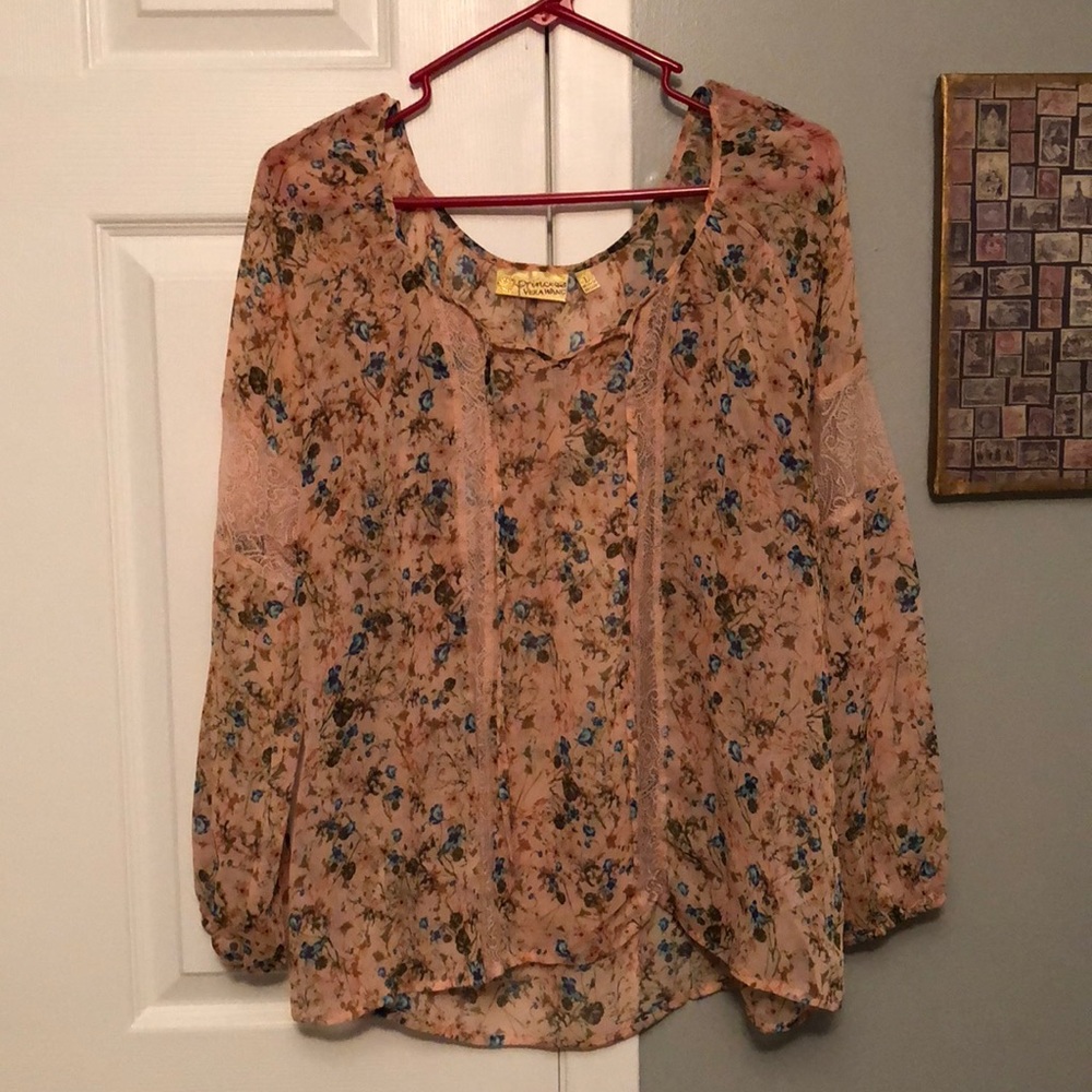 Women’s sheer floral blouse.